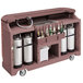 A white Cambro portable bar cart with a soda gun and 7 bottle speed rail.